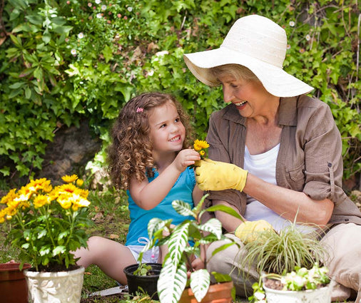 seniors and children gardening